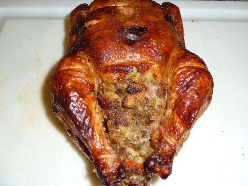 Stuffed Roasted Chicken in Wood Pellet Grill Smokin' Pete's BBQ