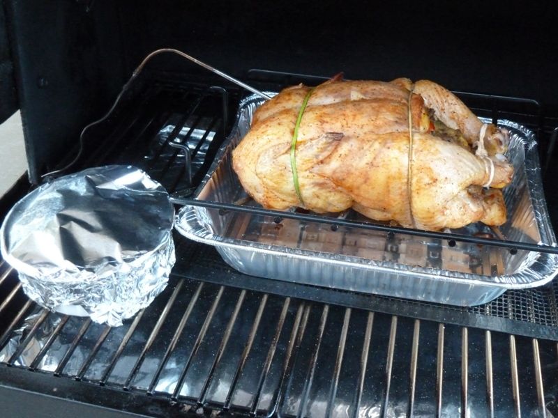 Stuffed Roasted Chicken in Wood Pellet Grill Smokin' Pete's BBQ